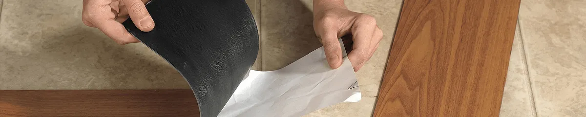 A professional installing vinyl flooring in Irvine, CA