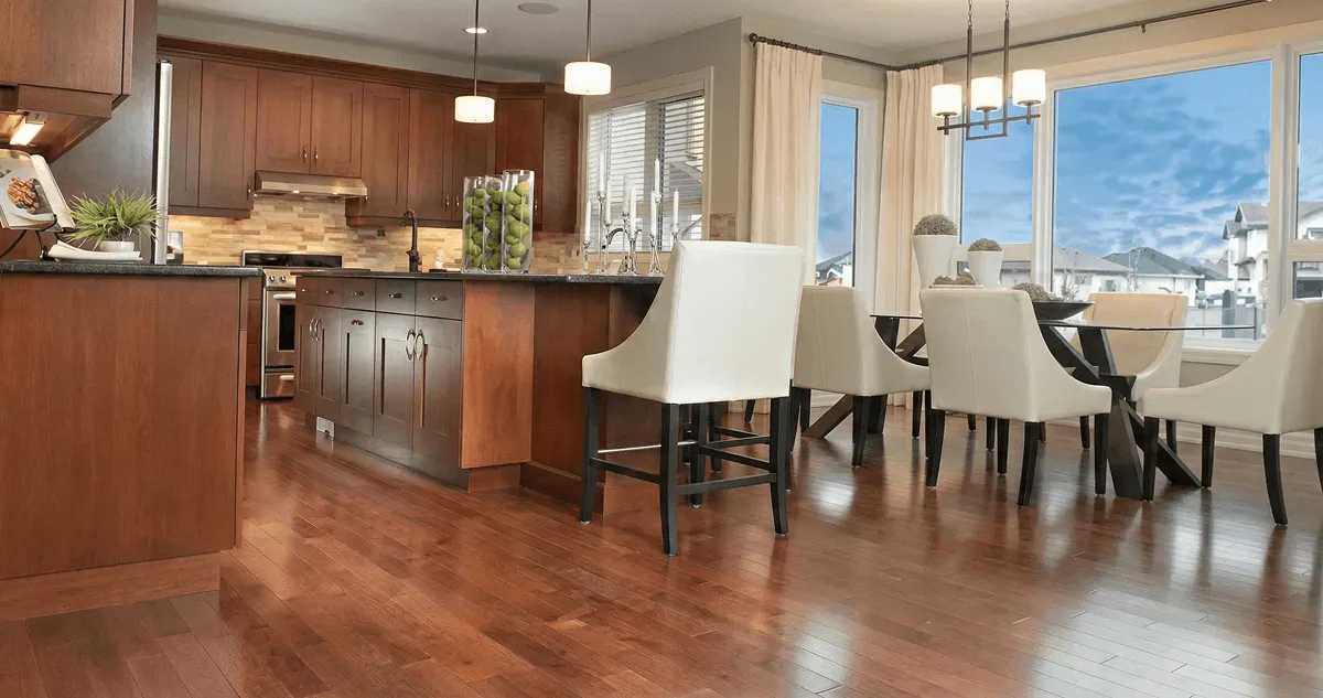 A modern kitchen with professionally installed wood flooring in Irvine, CA